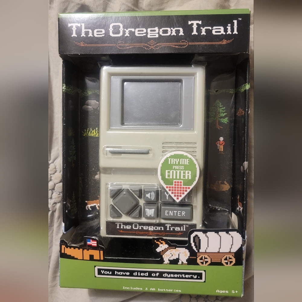 The Oregon Trail handheld game. New in box